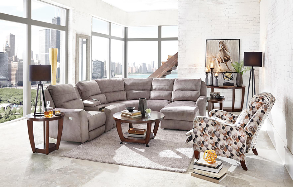 A small living room with furniture, a coffee table, and an accent chair.
