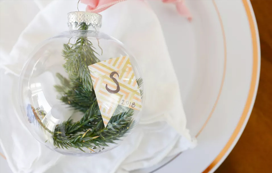 Filled glass ornament as place setting