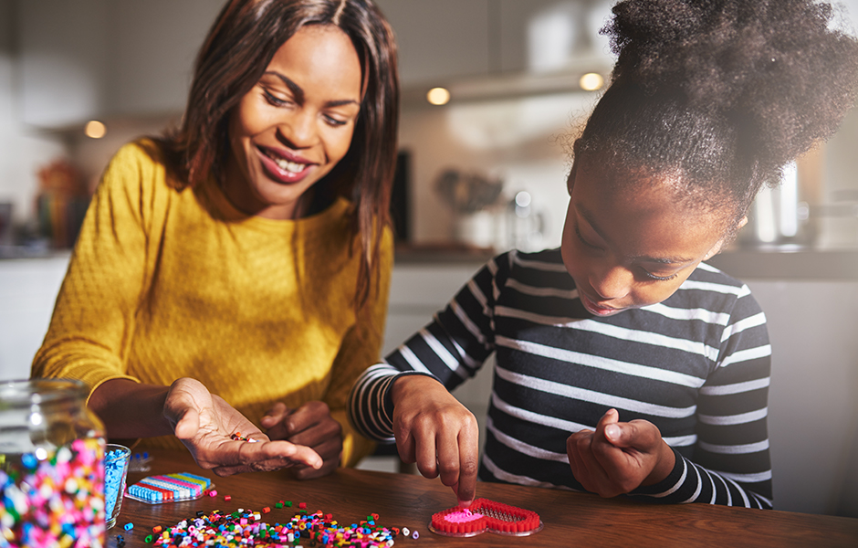 Mom and daughter making a craft project