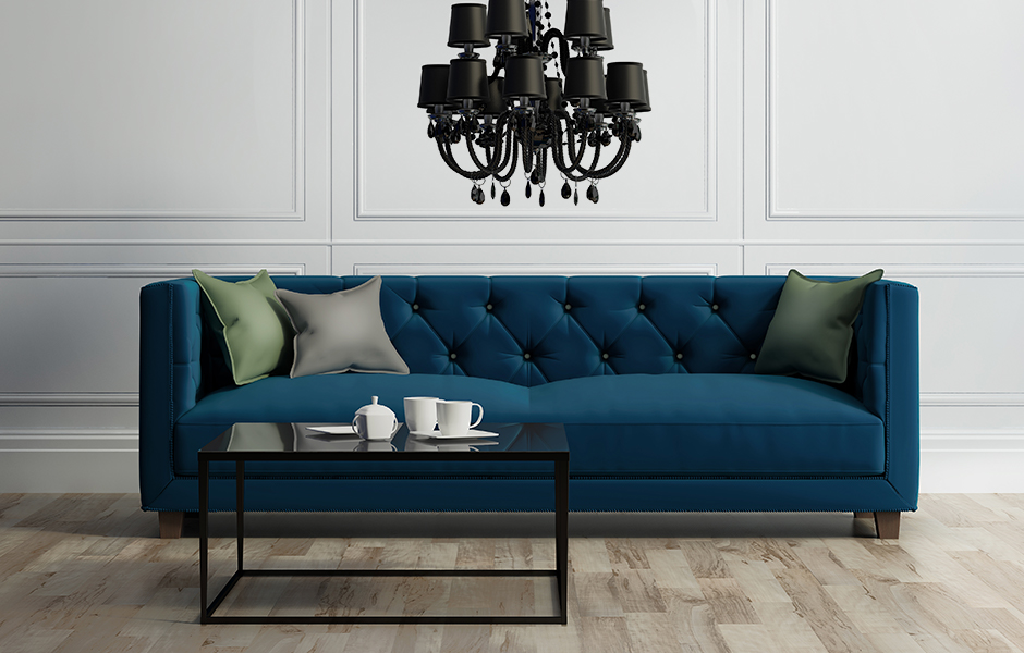 Living room with blue velvet couch