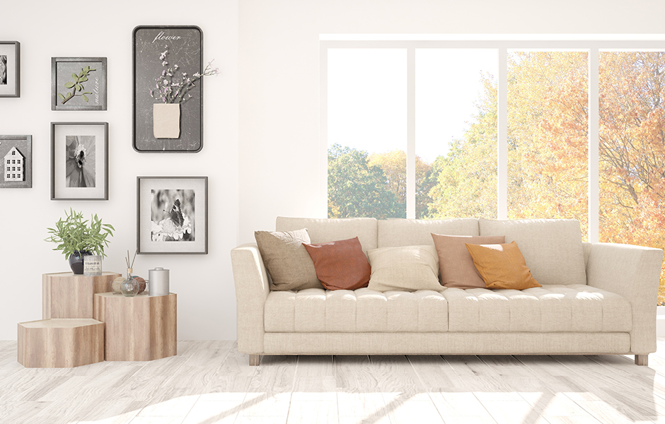 Living room with Scandavian interior design including soft colors and wood