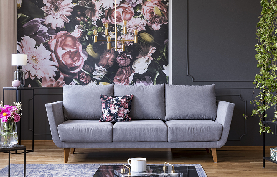 Living room with large scale floral wallpaper