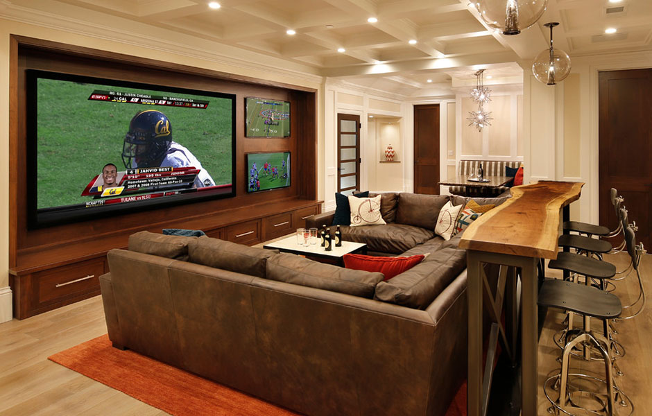 Man cave with roomy sectional to fit the whole family.