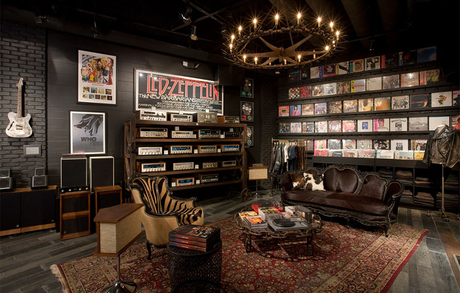 Best man cave for the music lover features rock and roll albums and state of the art musical equipment.