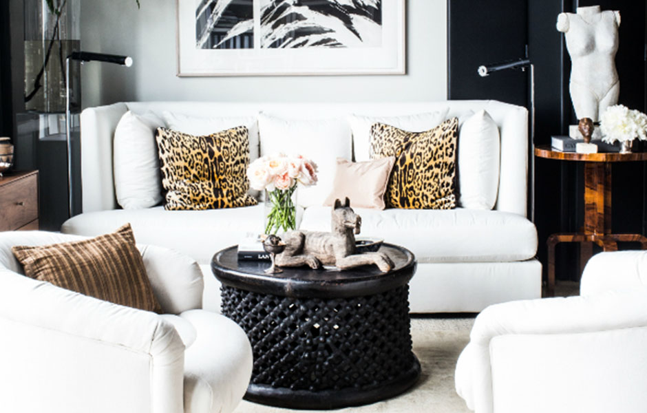 Black and white living room with hints of patterns.